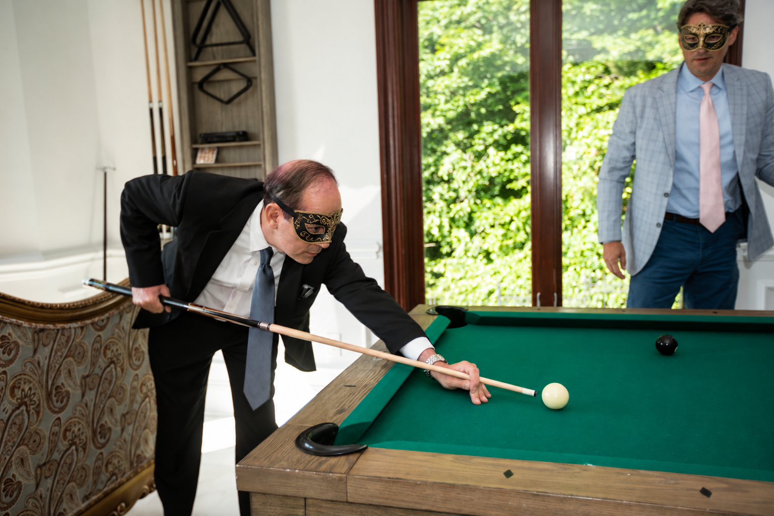 A game of billiards in the ballroom