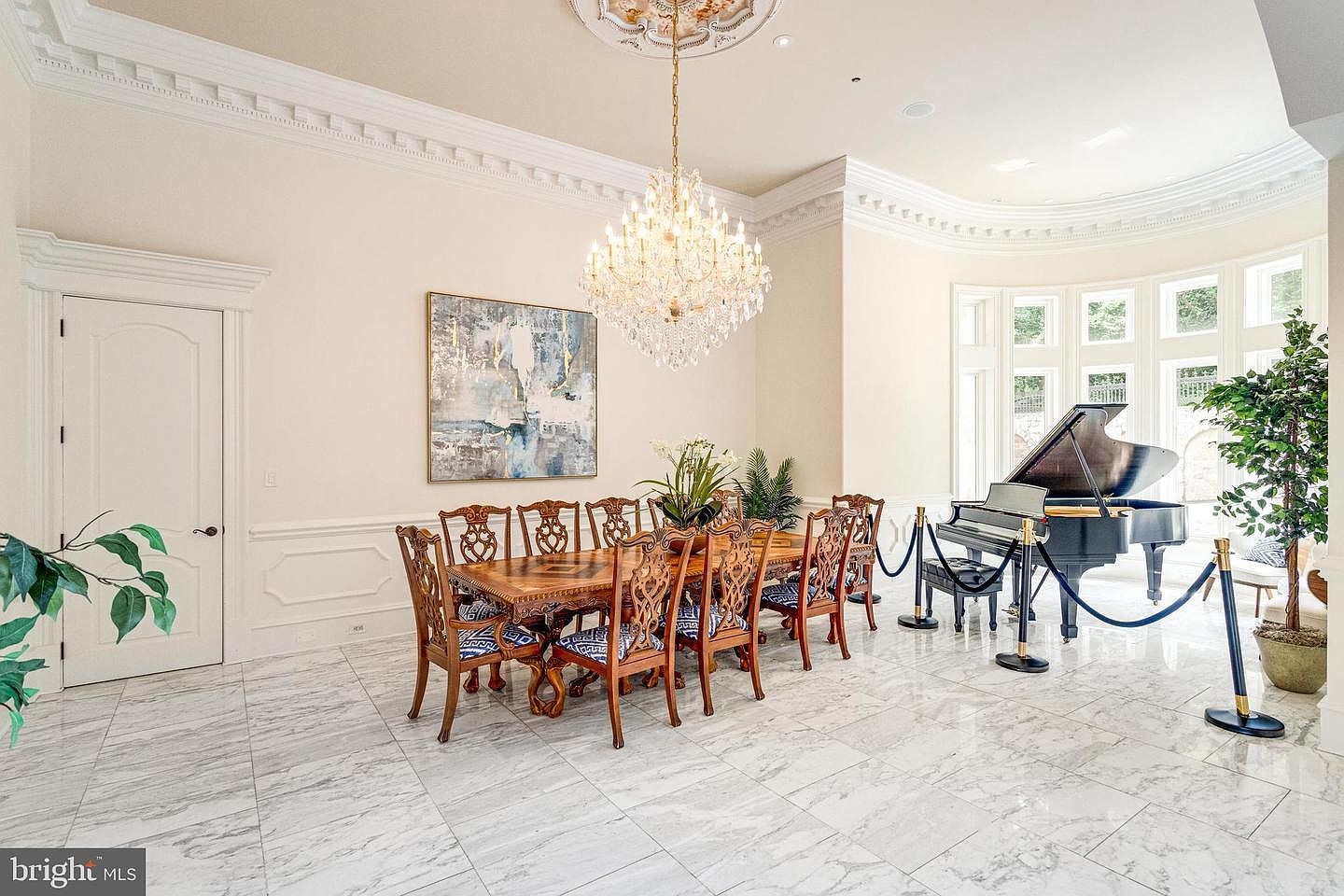 The dining room, with a piano at the far end.