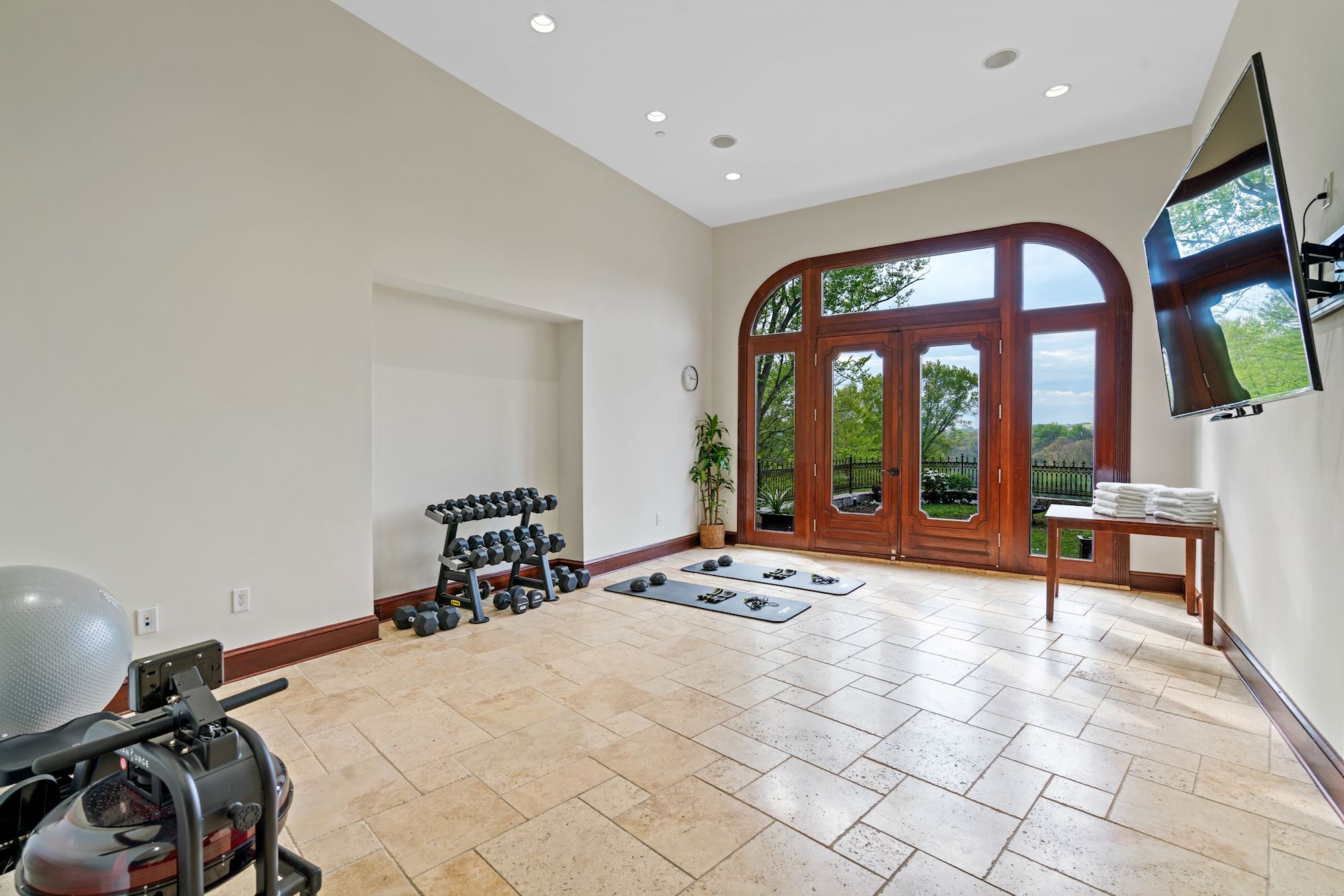 The gym, with arched doors to the lawn.
